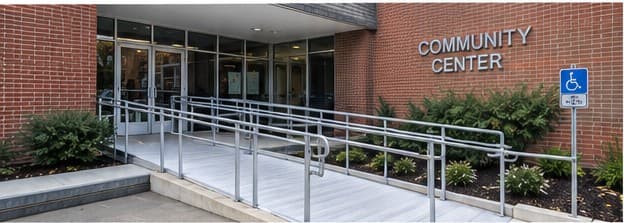 Accessible community center entrance with aluminum ramp